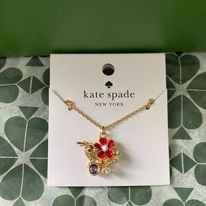 Kate spade NWT lucky dragon pendant with red flower